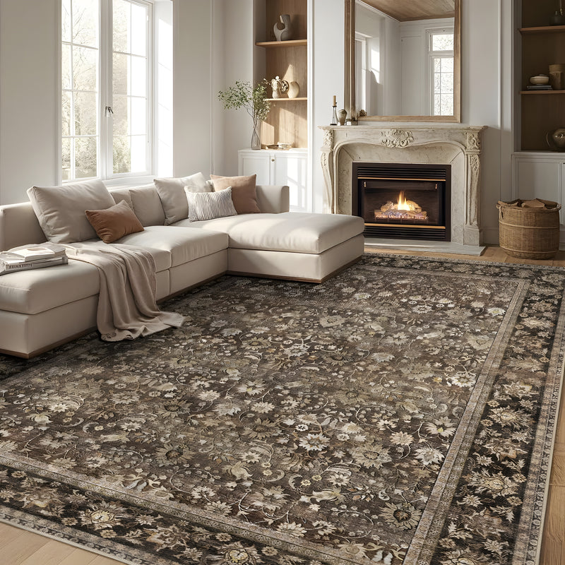 Large vintage rug on the floor in a living room, adding warmth and style.